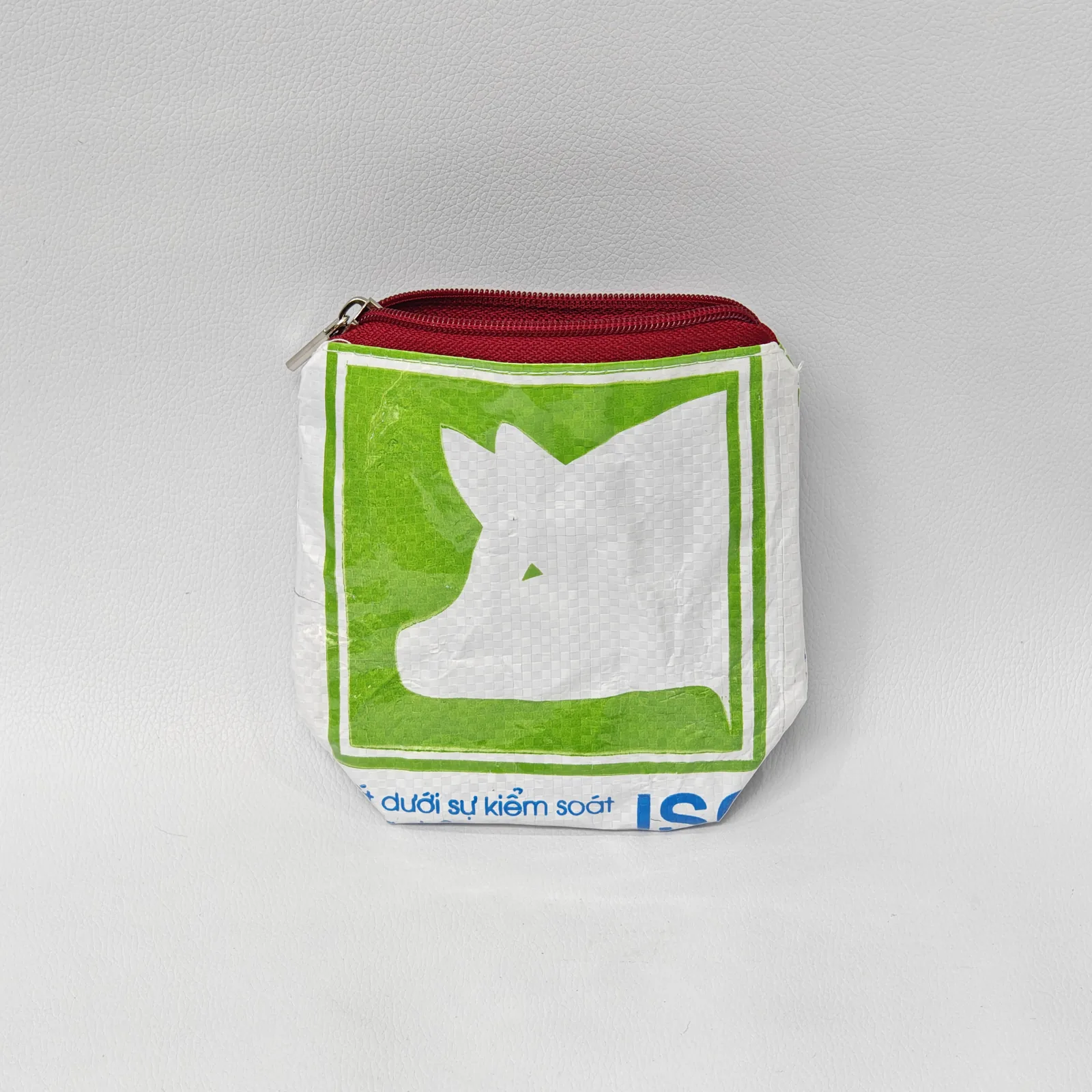 Blue seal-print pouch showing coordinating color variation