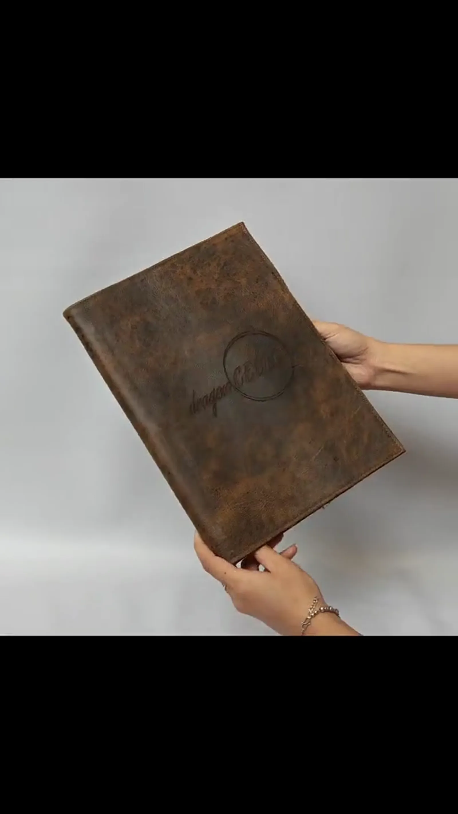 360-degree video of the leather menu cover