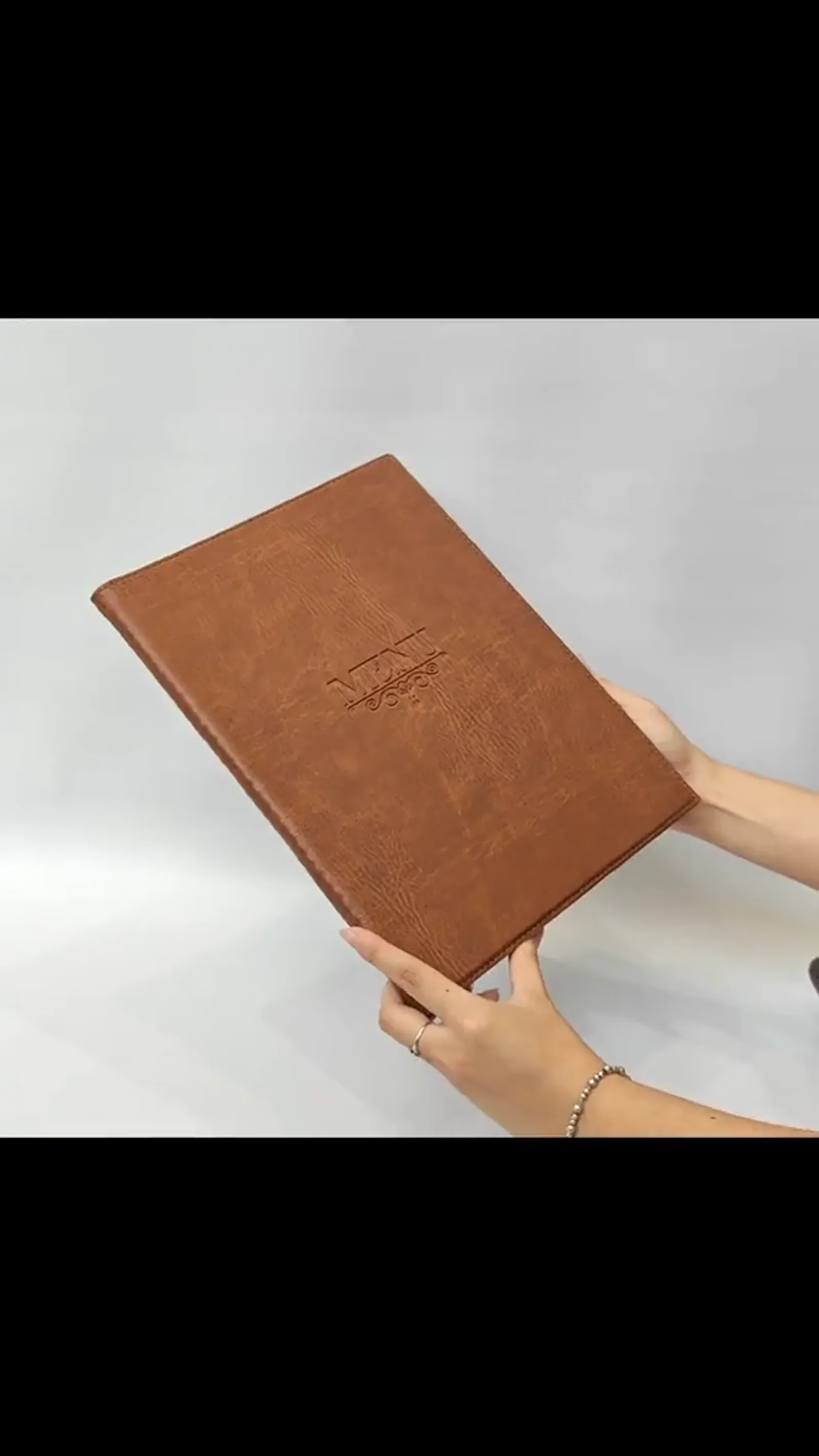 360-degree video of the leather menu cover
