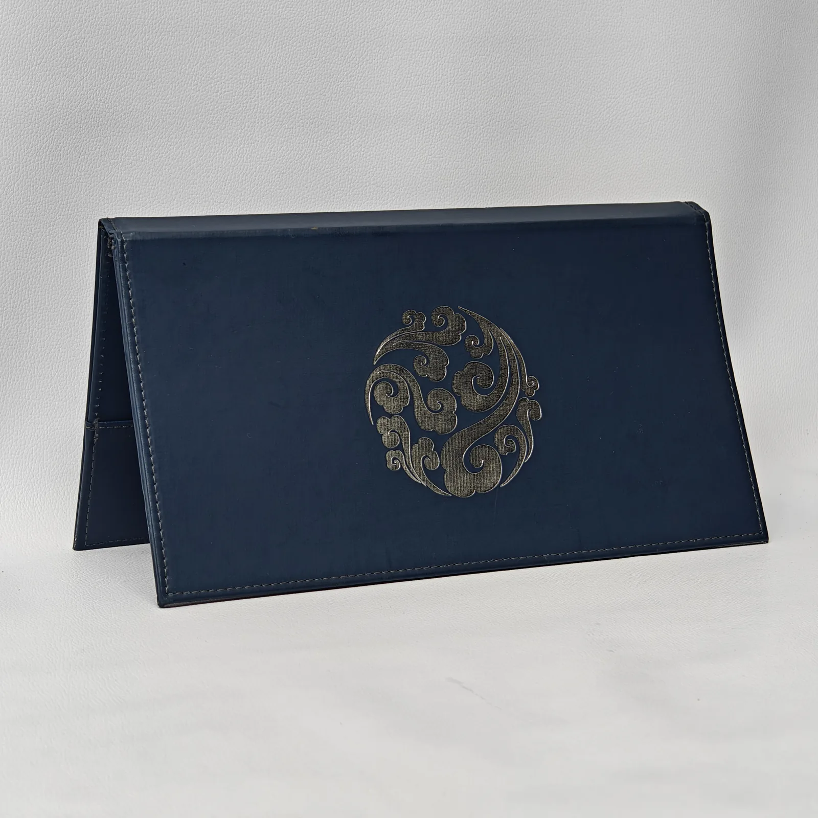 Back panel with decorative gold foil ornamental pattern
