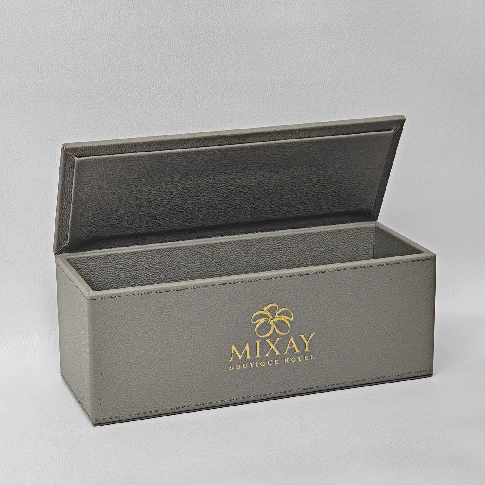 Interior view of leather amenity box with protective lining