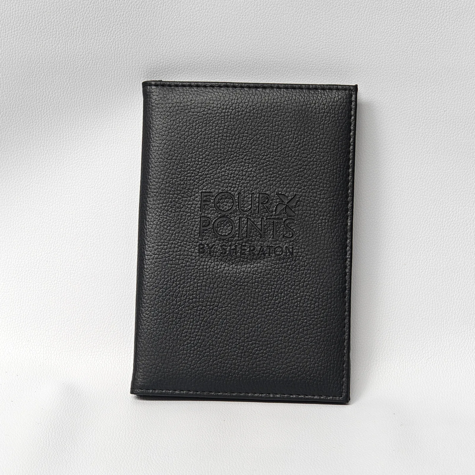 Large bill presenter in taupe leather showing professional branding