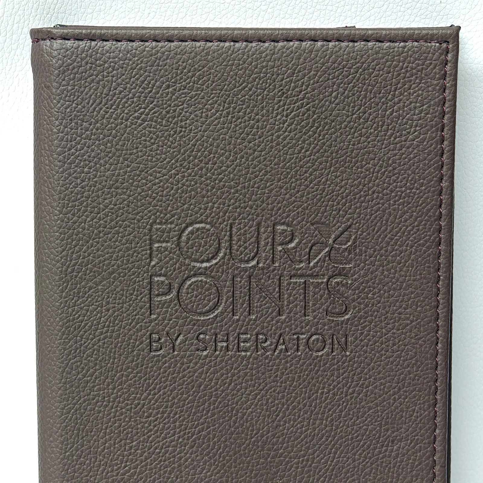 Open bill presenter showing interior card pocket slots for bill inserts