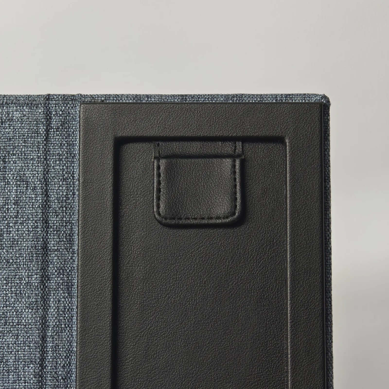 Interior card pocket with embossed corner detail on leather